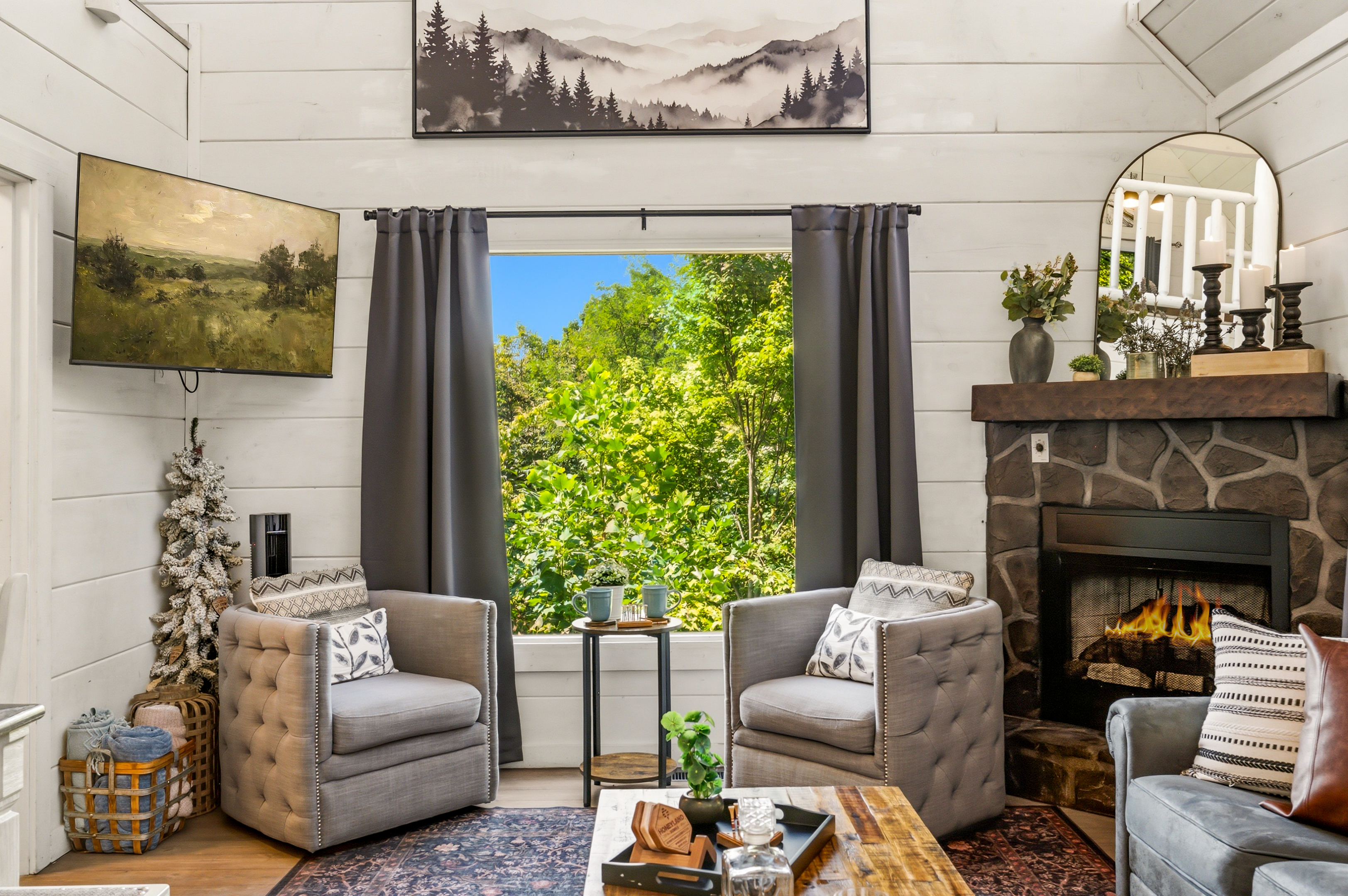 Living room w/ fireplace & TV | 1st Floor
