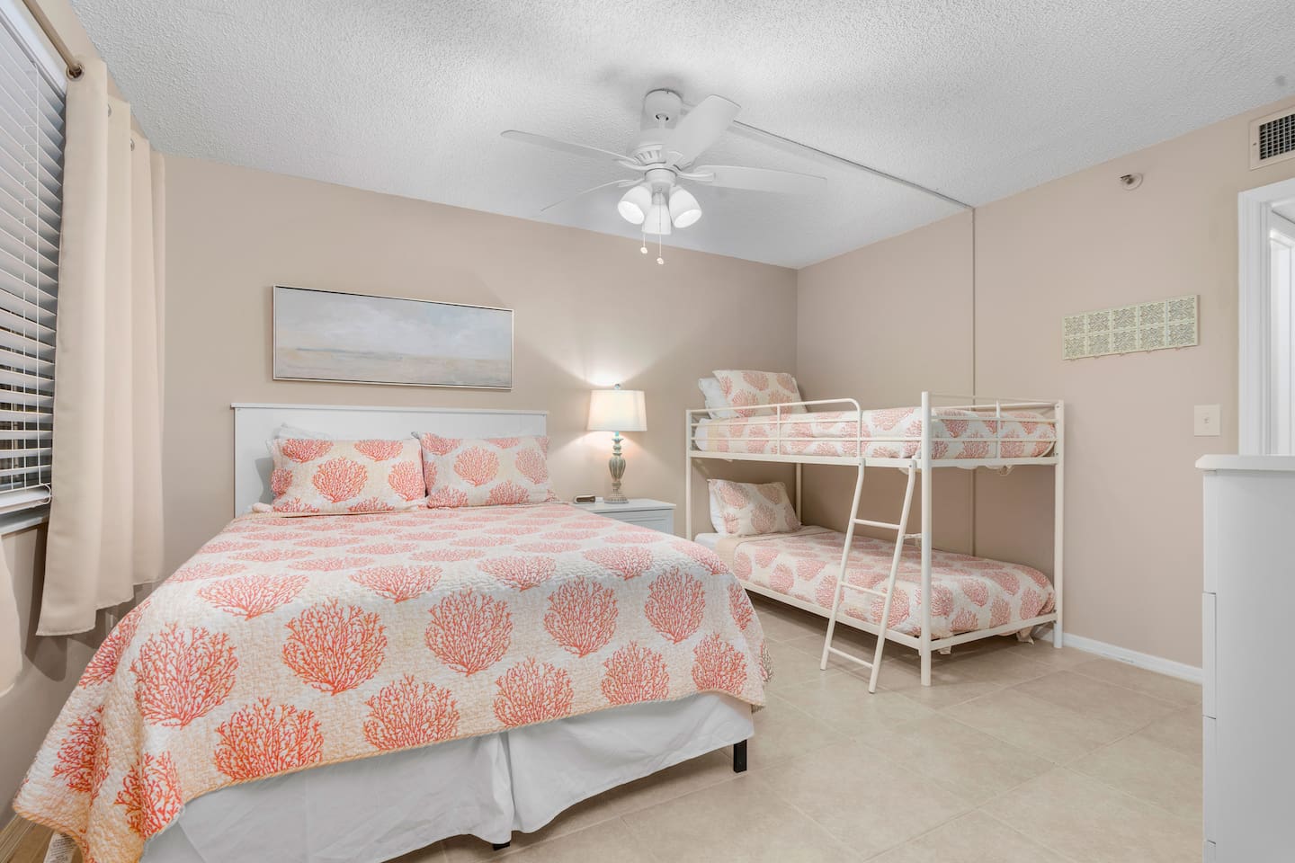 Bedroom 2 with Queen Bed and Twin Bunks. 