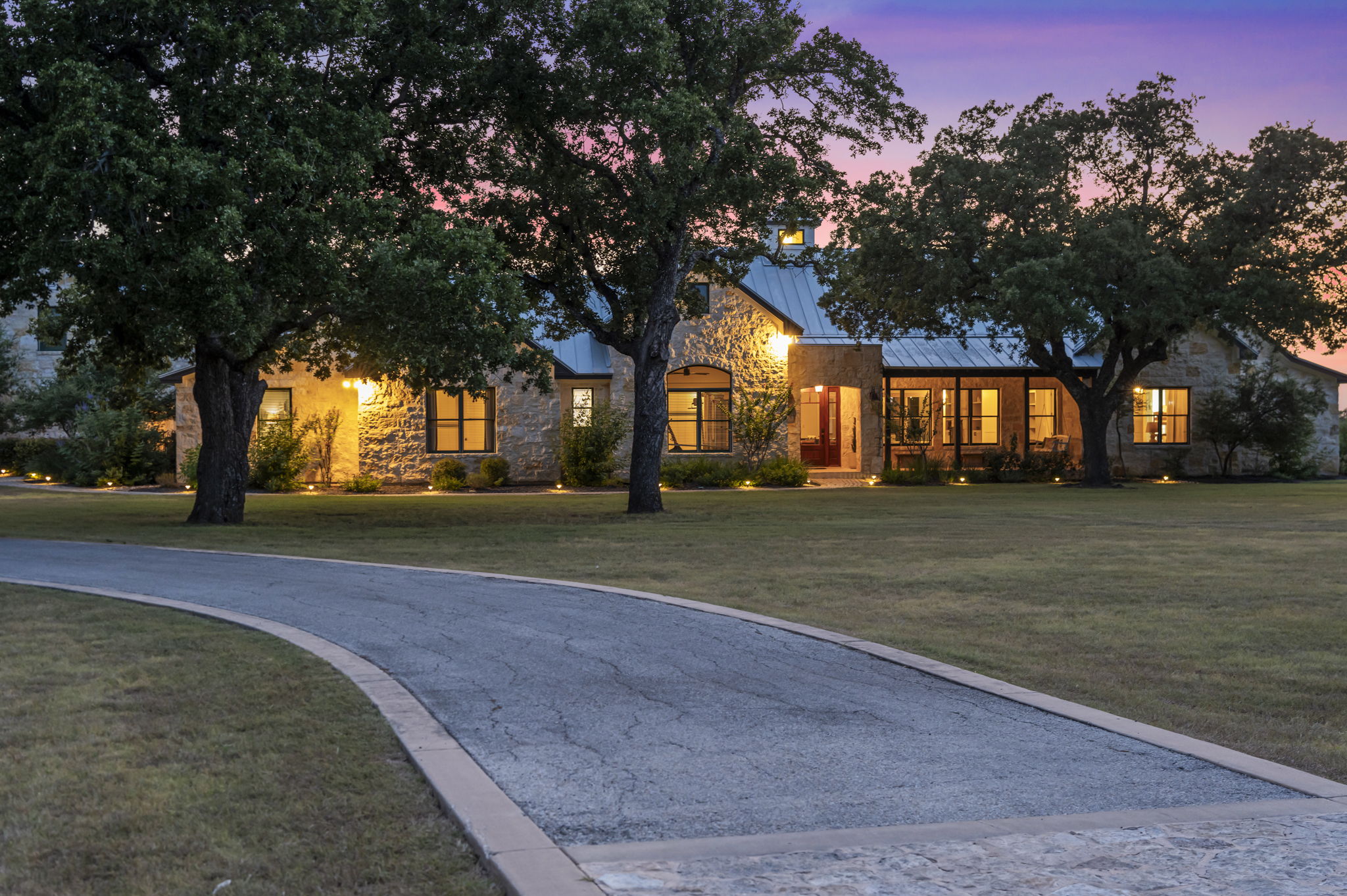 Twilight hues painting the sky over a peaceful home.