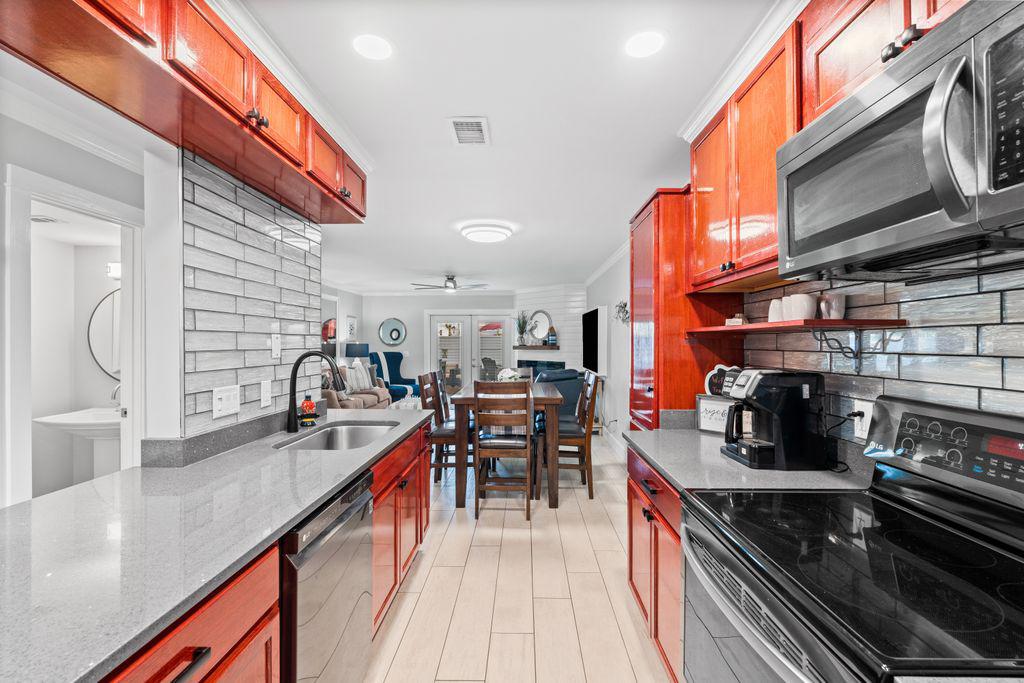 Large galley kitchen with all appliances