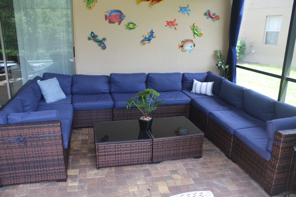 LOTS of seating with this comfy sectional patio set and table