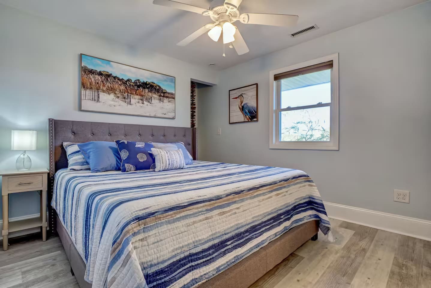 Master bedroom with king bed and ensuite bathroom.