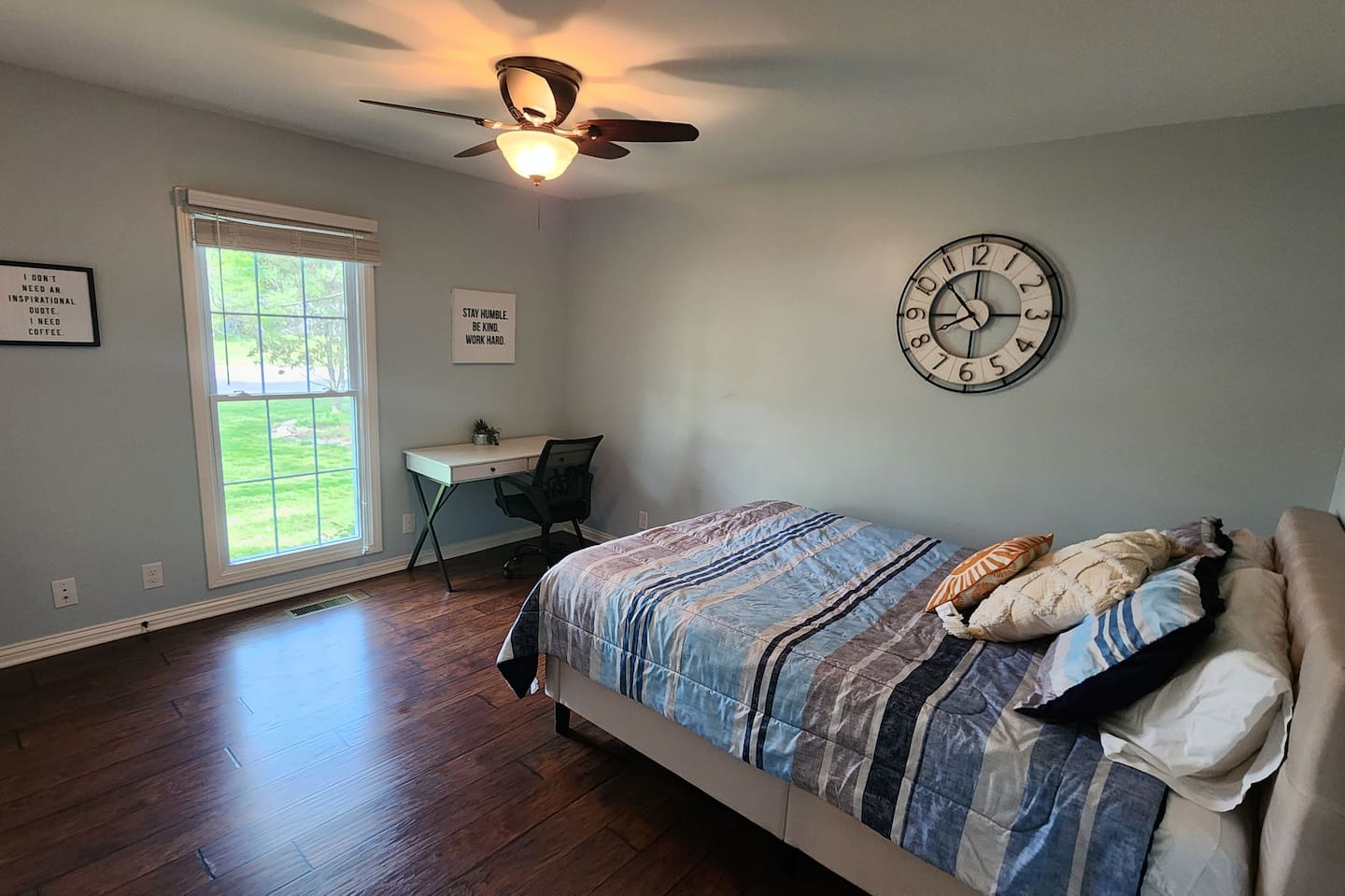 Queen bed with workspace. 