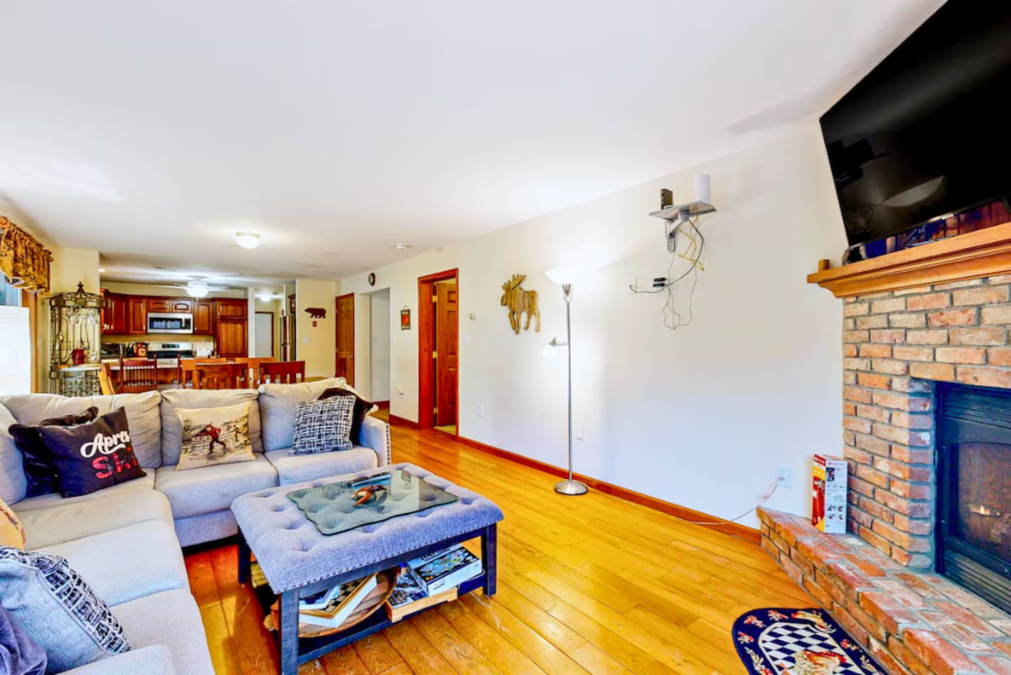 Plenty of room for the whole family, relax by the fireplace or play cards at the dining table in the lovely open concept home! 