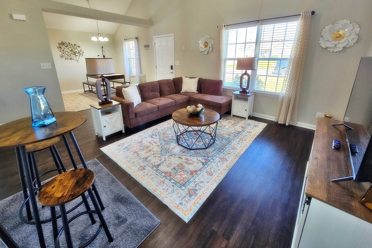 Kick back, relax in this comfy living room, and watch your favorite movie or show on the flat-screen smart TV.