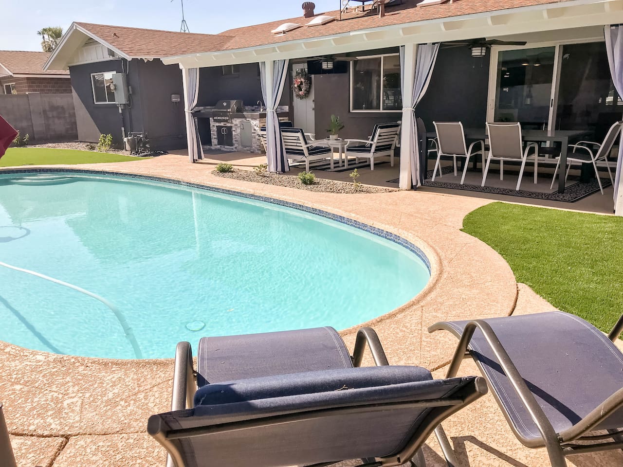 Pool seating and grass!; patio with TV!