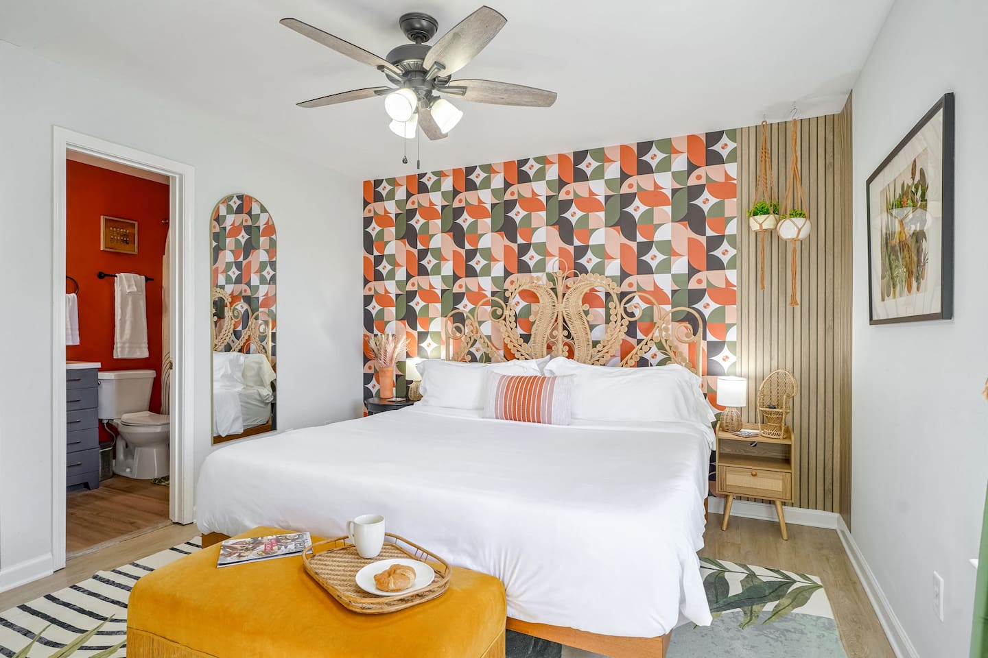 Enjoy the upstairs master BR's king-sized bed, Roku Smart TV, and chic en suite bathroom! 