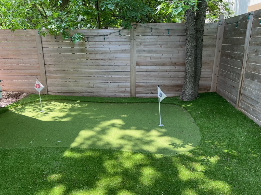 high end putting green in yard
