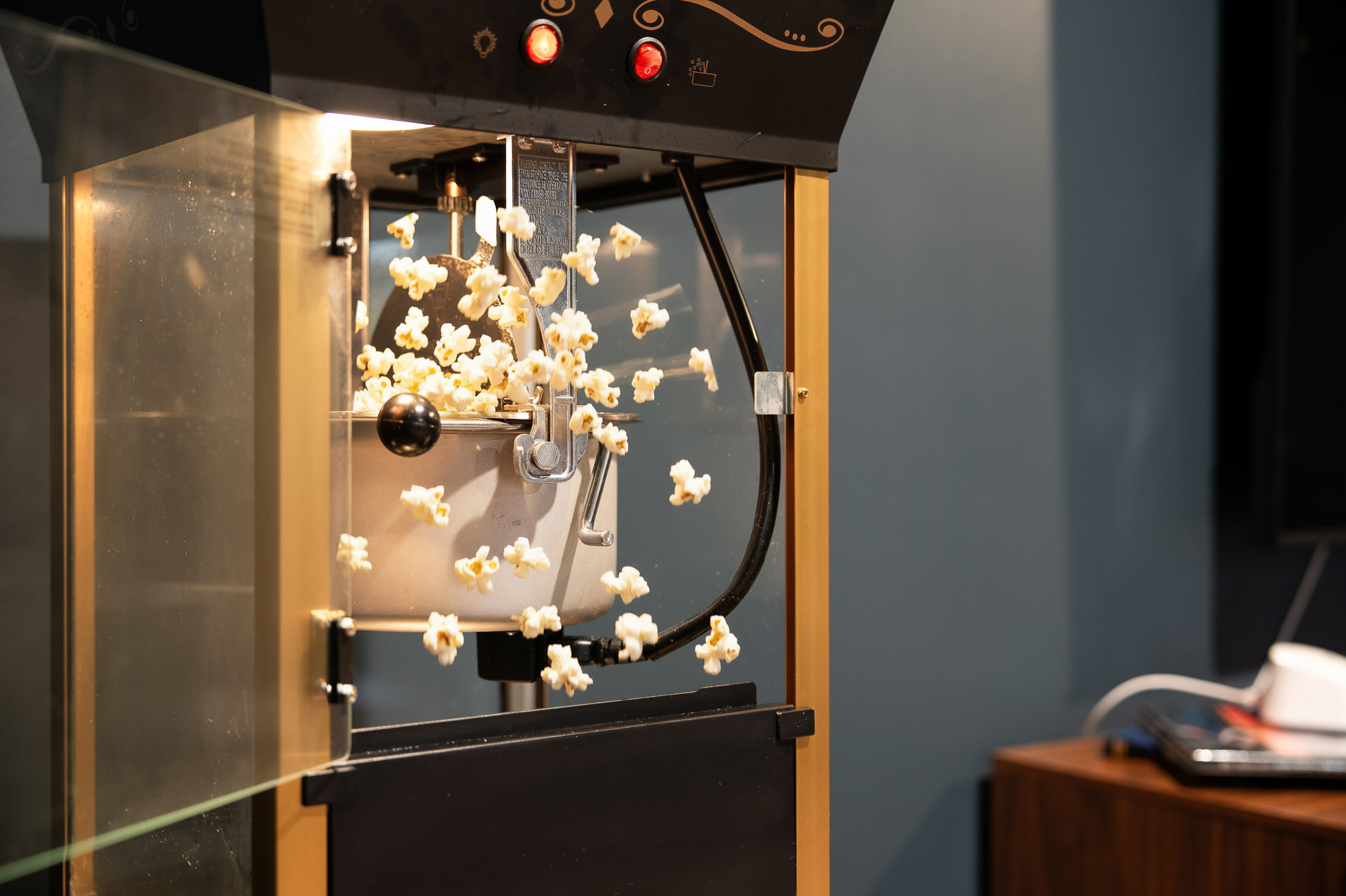 A retro-style popcorn machine completes the movie night vibe—just add your favorite film.