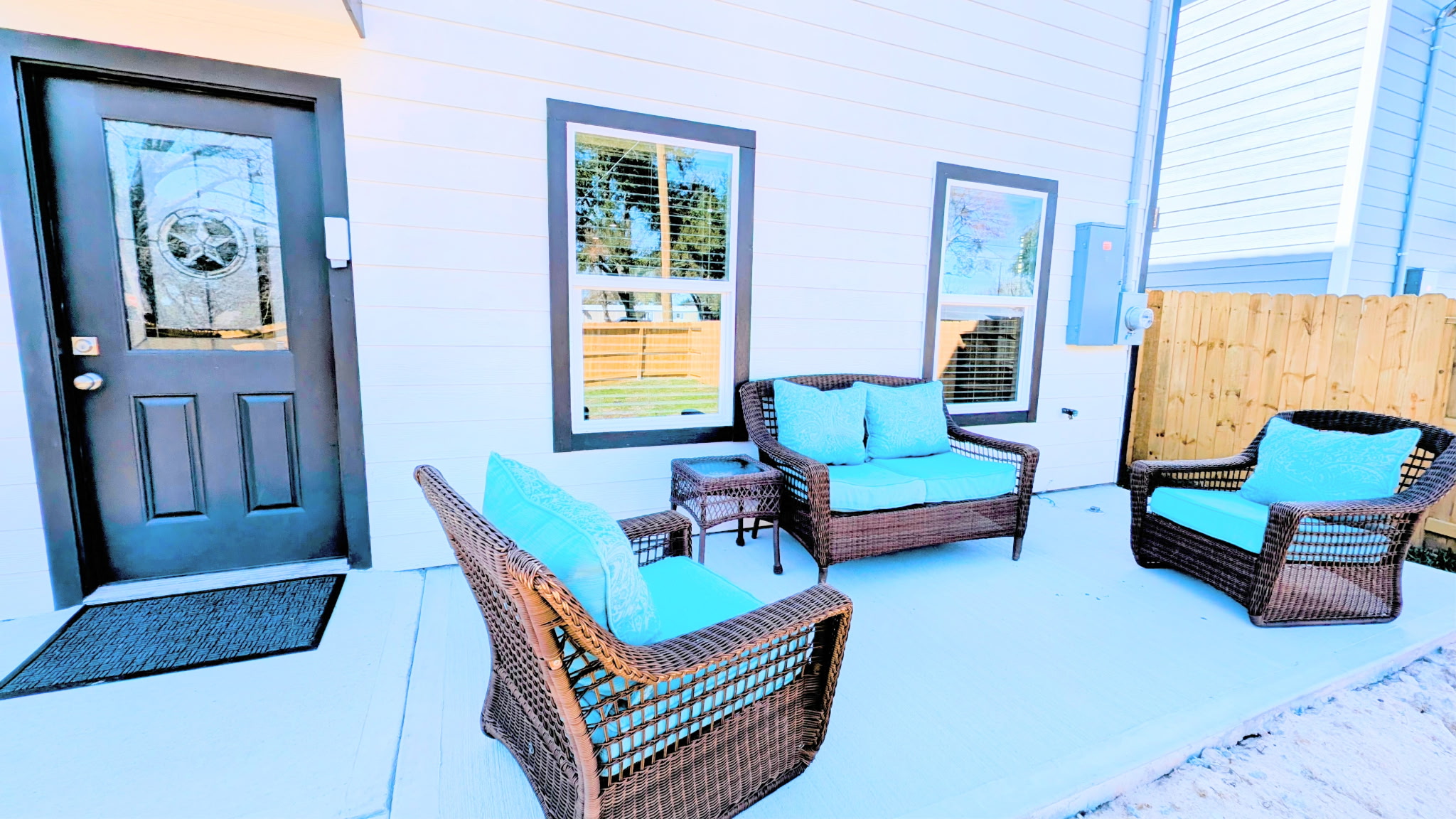 Relax on the spacious back patio with fully fenced yard.