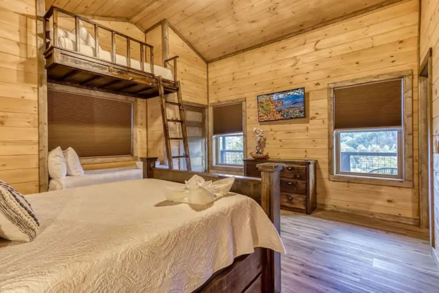 Moose room. Located on the third floor.  This bedroom has a queen sixe bed and custom bunk.