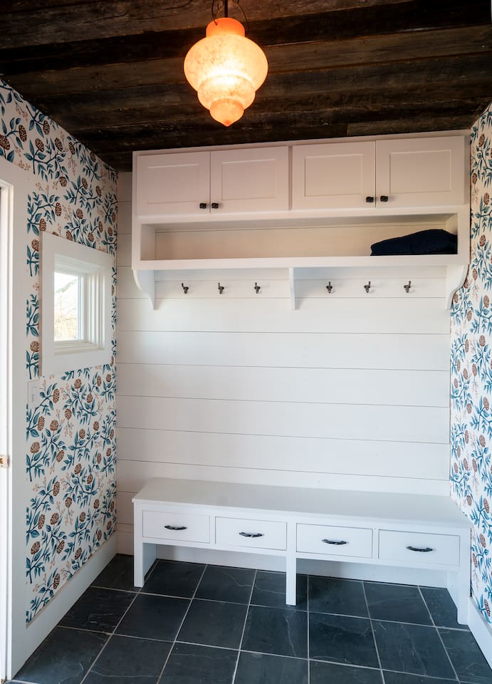 Mudroom entryway--a place for Carolina red-muddy boots and shoes.