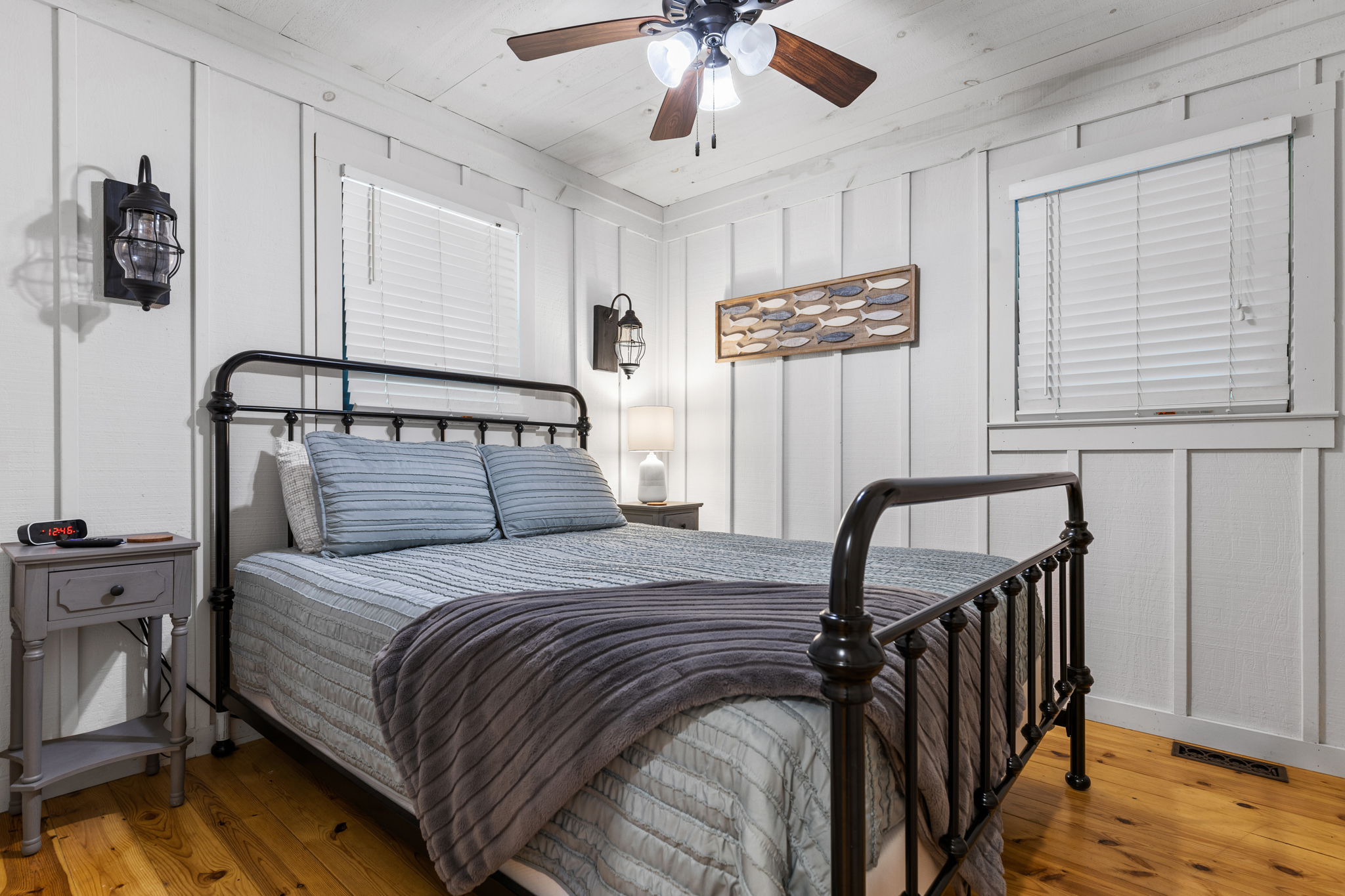 The comfortable queen bedroom offers a peaceful place to recharge after a day on the river.