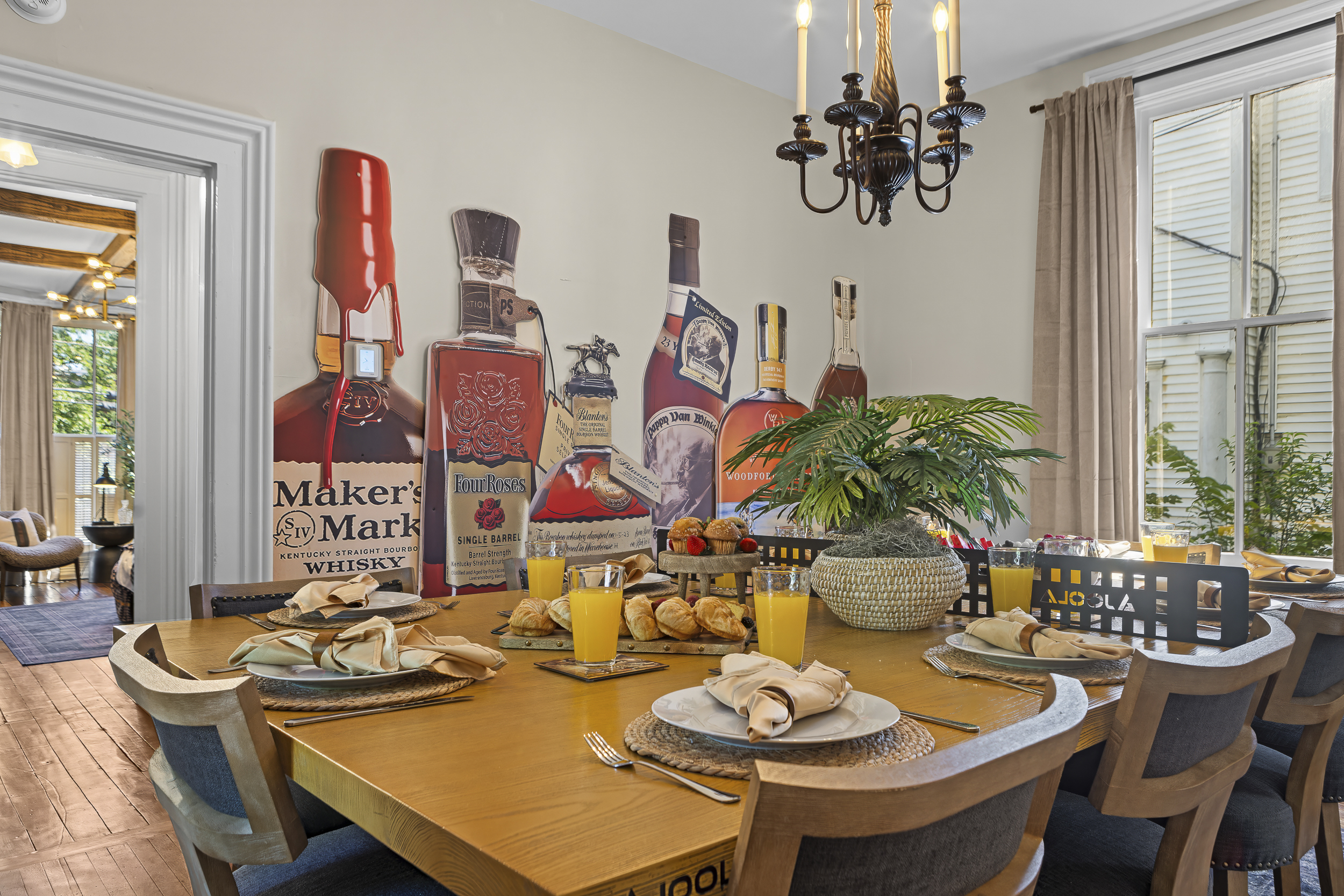 The Maker’s Mark mural provides a distinctive backdrop for every meal, offering a dining space that feels both intimate and spacious enough for up to ten guests.