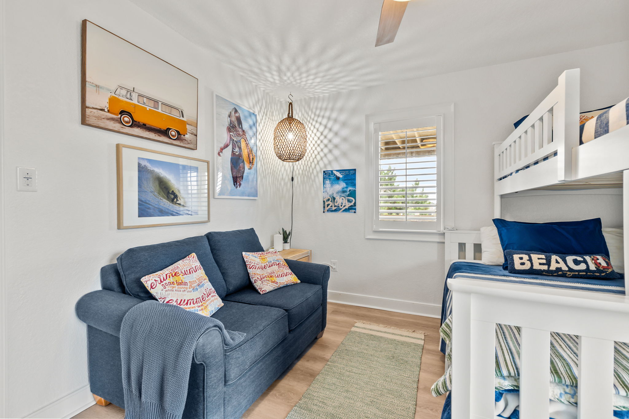 Bunk room with twin beds and a couch, great for kids or extra guests!