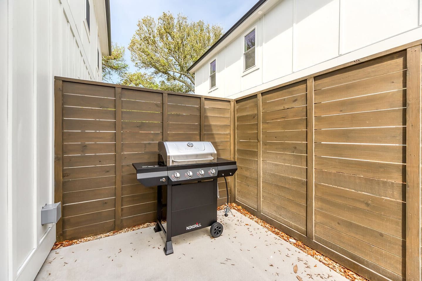 Private patio with gas grill & fenced privacy