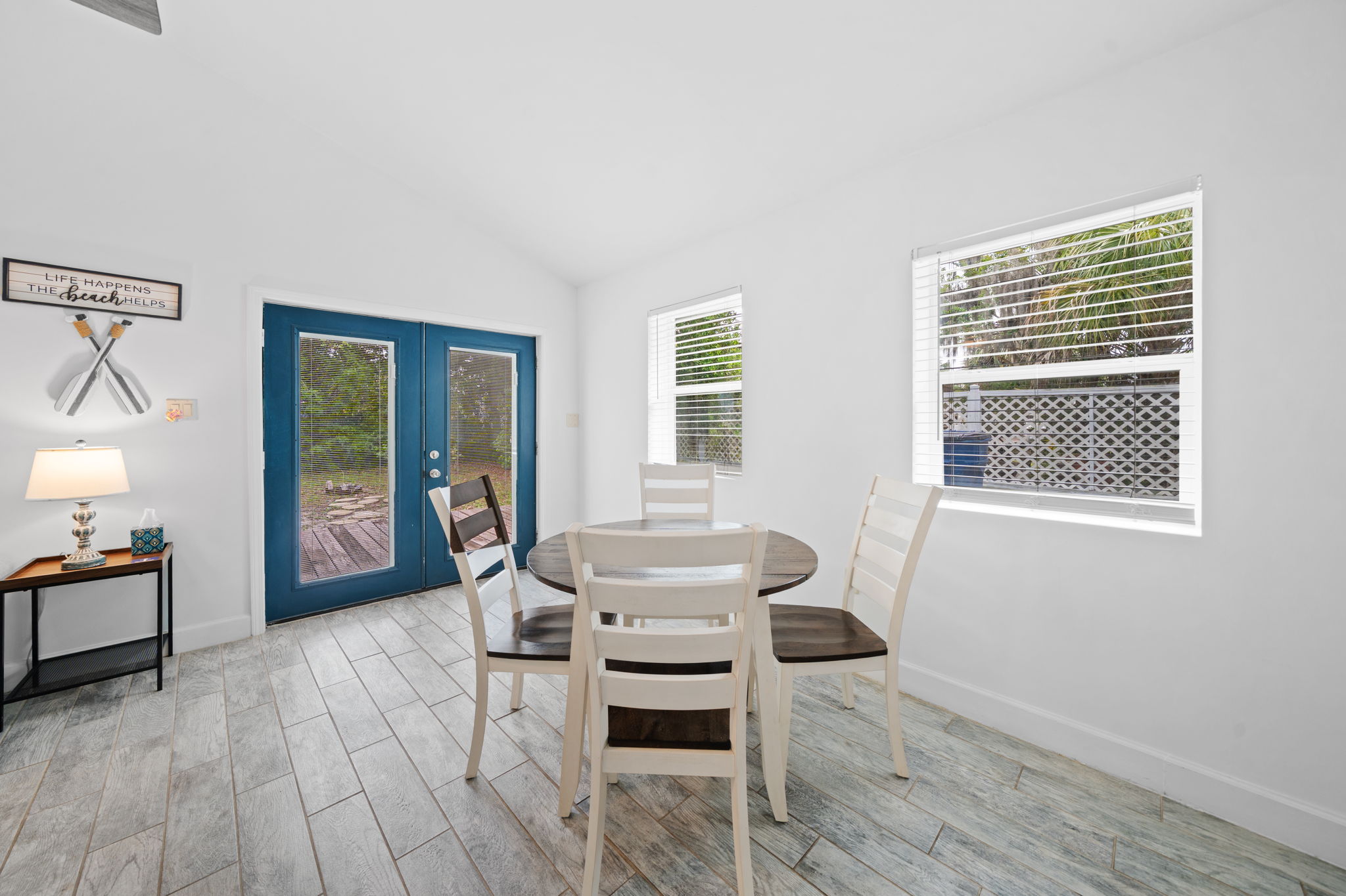 Dining area with seating for four and easy access to the backyard