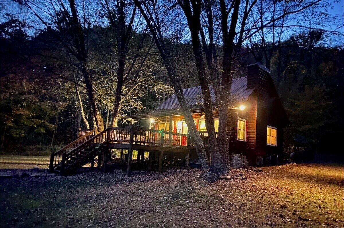 Cabin on spacious lot allowing for peaceful surroundings and quite nights on the deck, in the hot tub, or sitting around the fire pit.