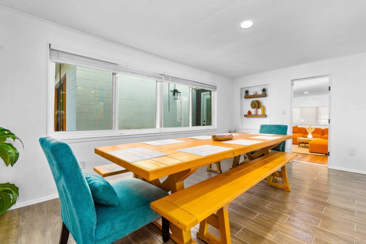 Our custom-made 10-ft dining room table will seat your entire group. 