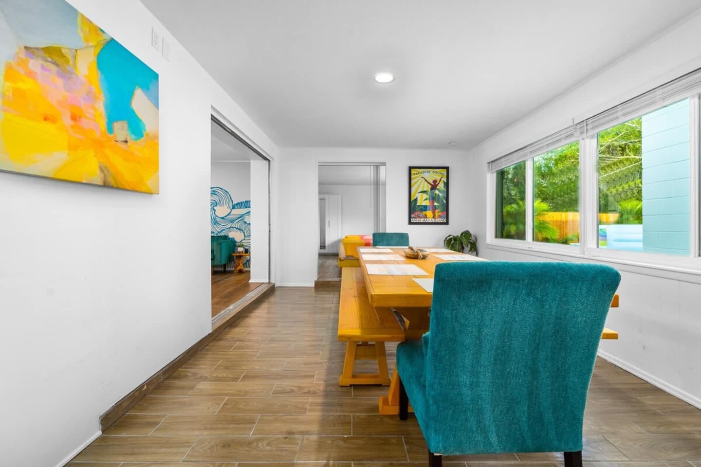 Our custom-made 10-ft dining room table will seat your entire group. 