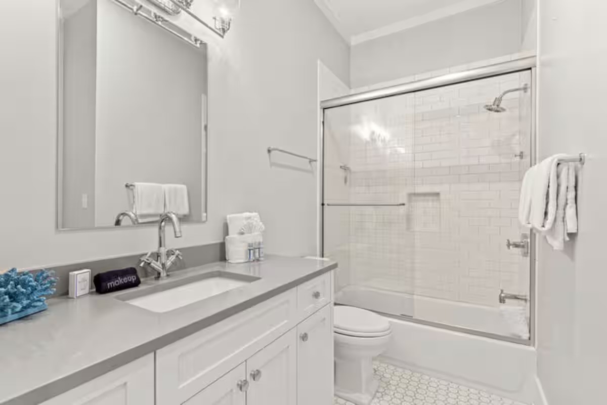Hall Bath directly to the queen bedroom and also services the bunk room
