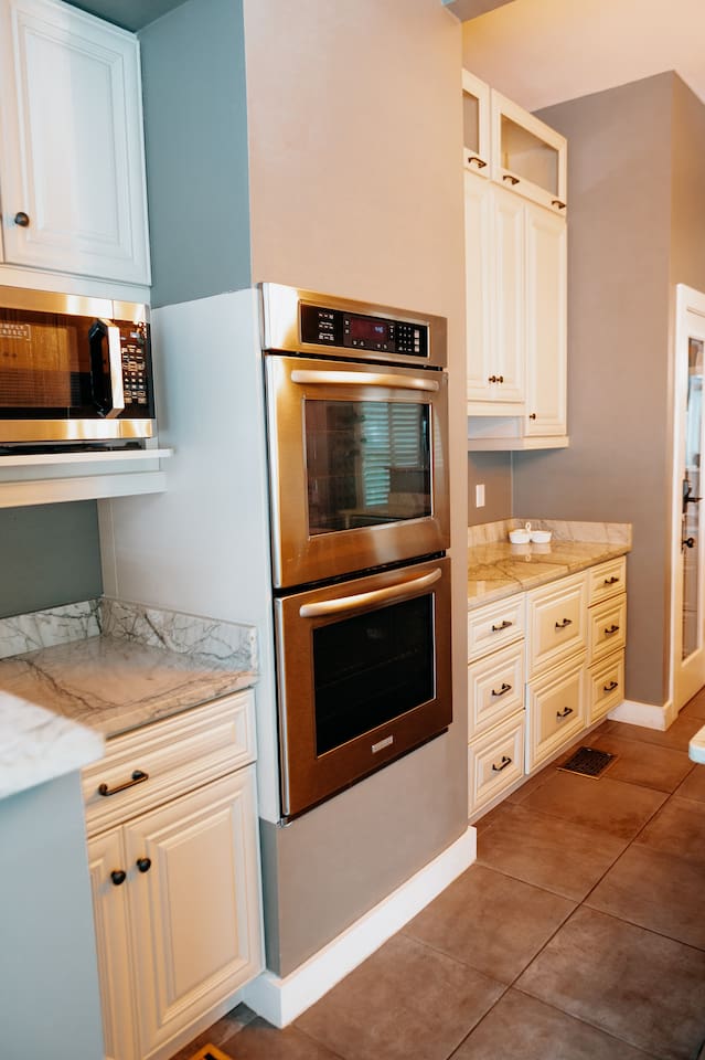 Double oven, microwave, gas stove and oversized refrigerator and freezer. 