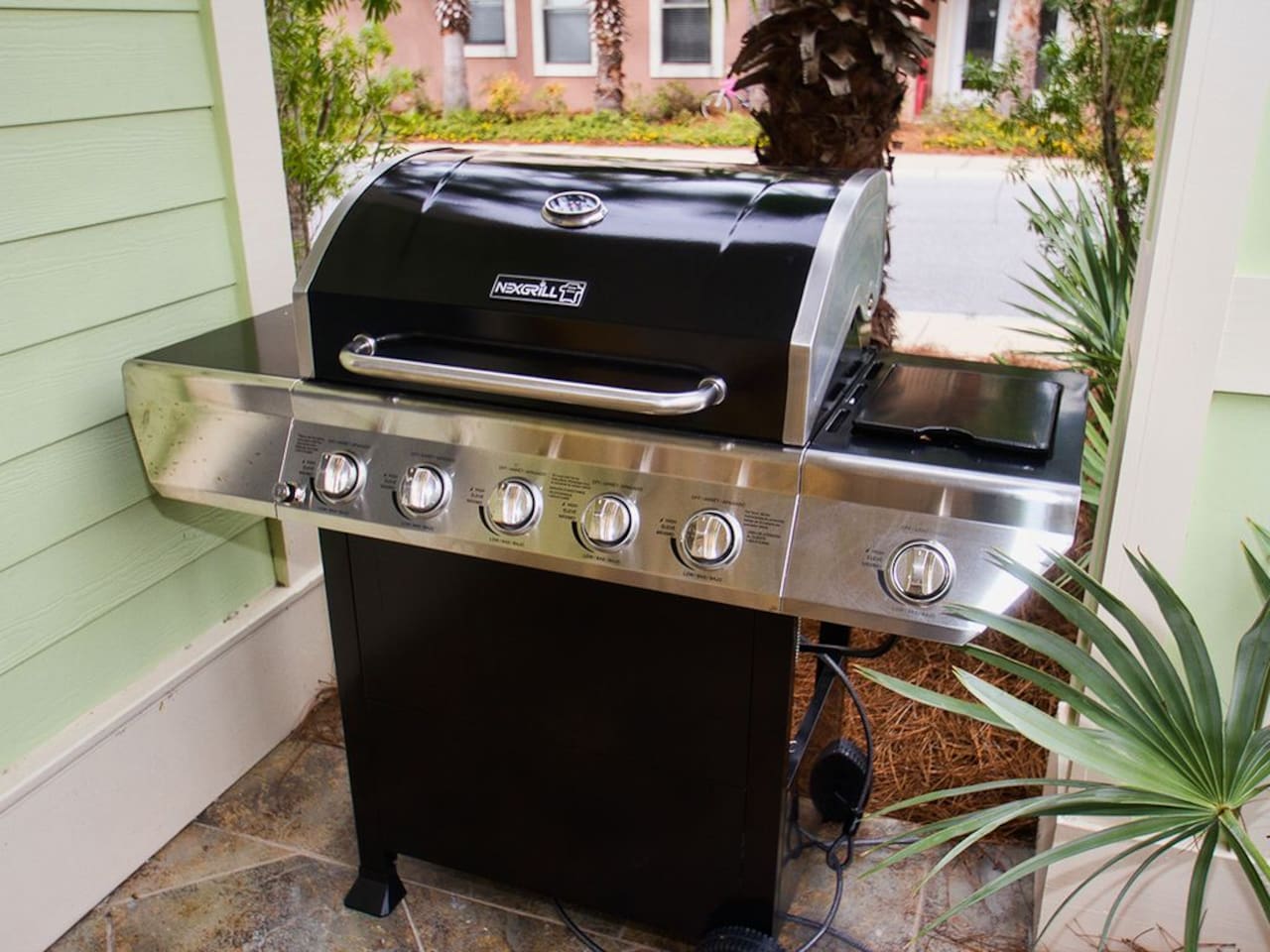 Private covered BBQ grill, complete with propane gas for hassle-free outdoor cooking.