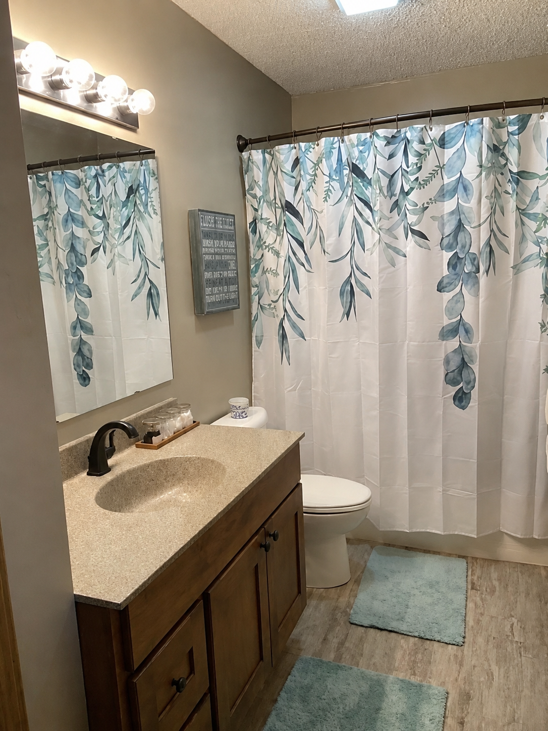 Bathroom with botanical shower curtains