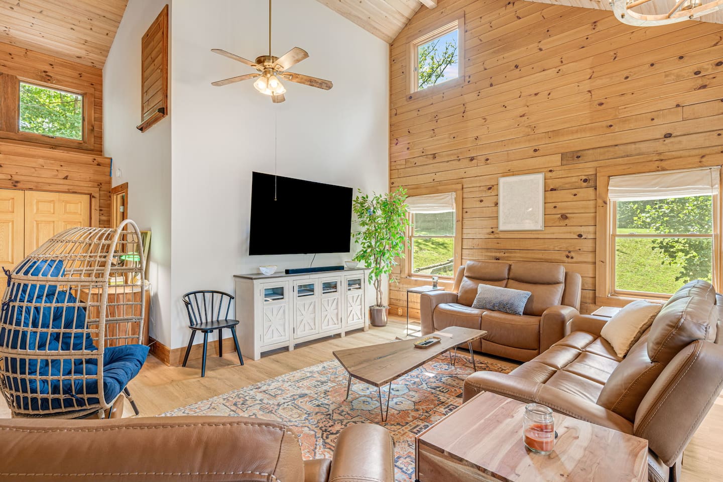 The open living space has plenty of room for everyone to enjoy a movie night together. The sofa is also a pull out queen bed!