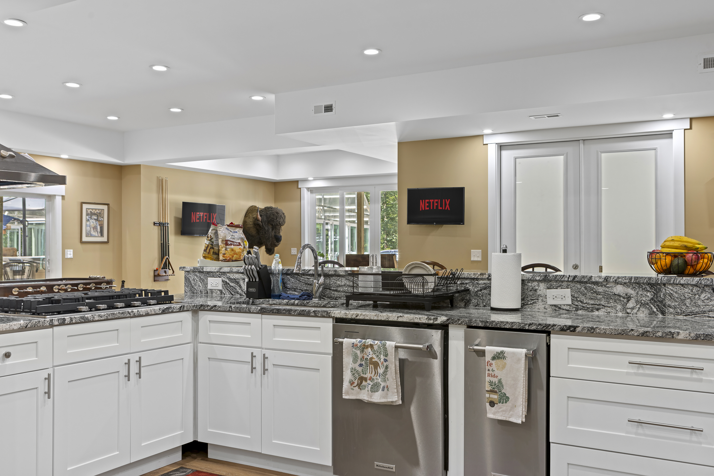 Gourmet Kitchen: Whip up delicious meals with top-notch appliances and plenty of granite workspace!