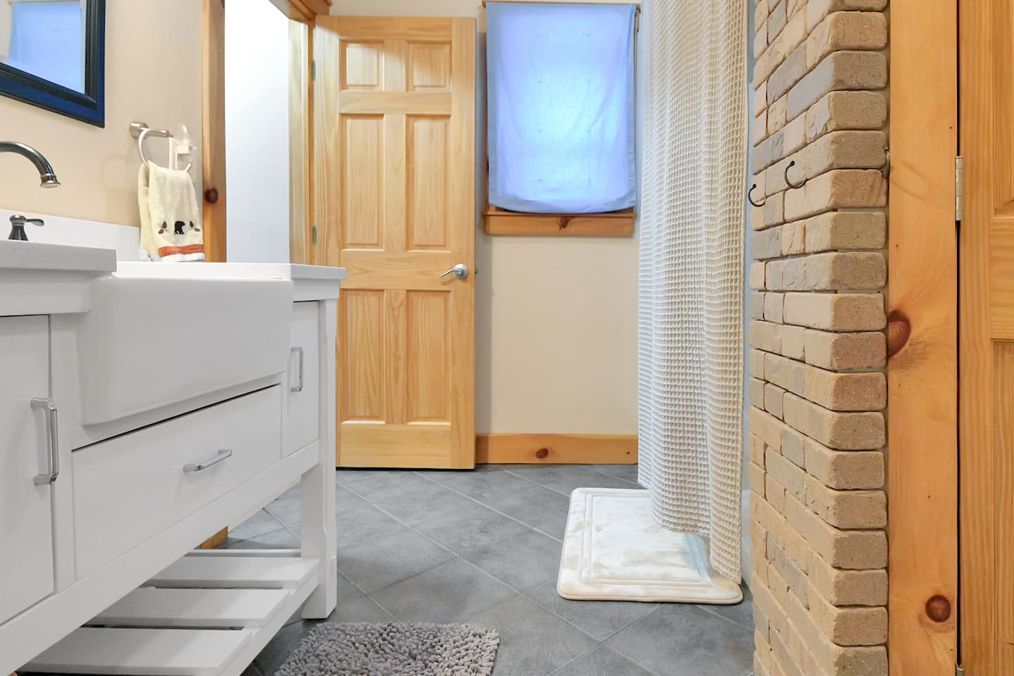 This bathroom is on the first level of the second property, equip with full shower and stand up washer/dryer!