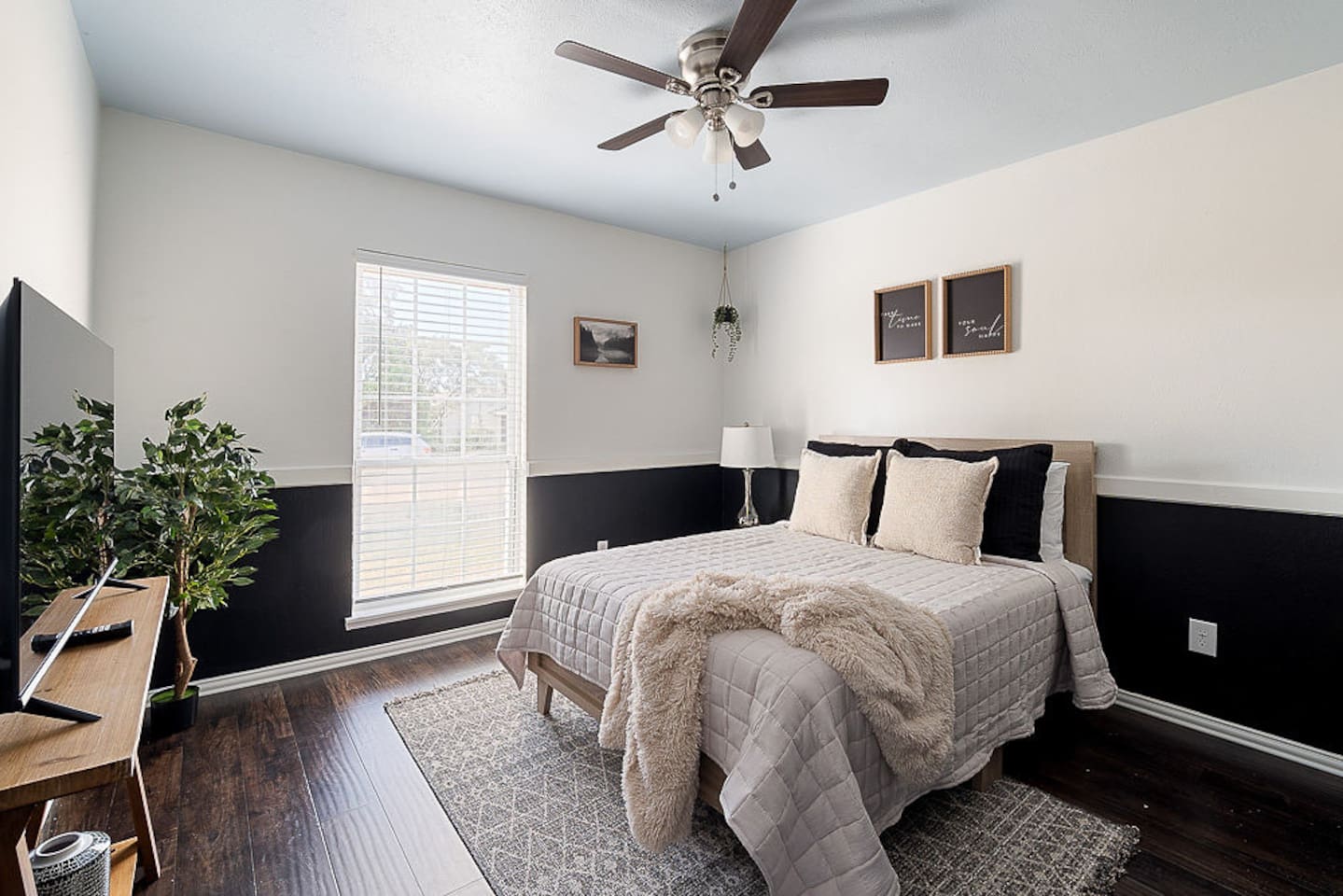 Enjoy this serene bedroom with a queen-size bed, nightstand, lamp and personal TV for your ultimate relaxation