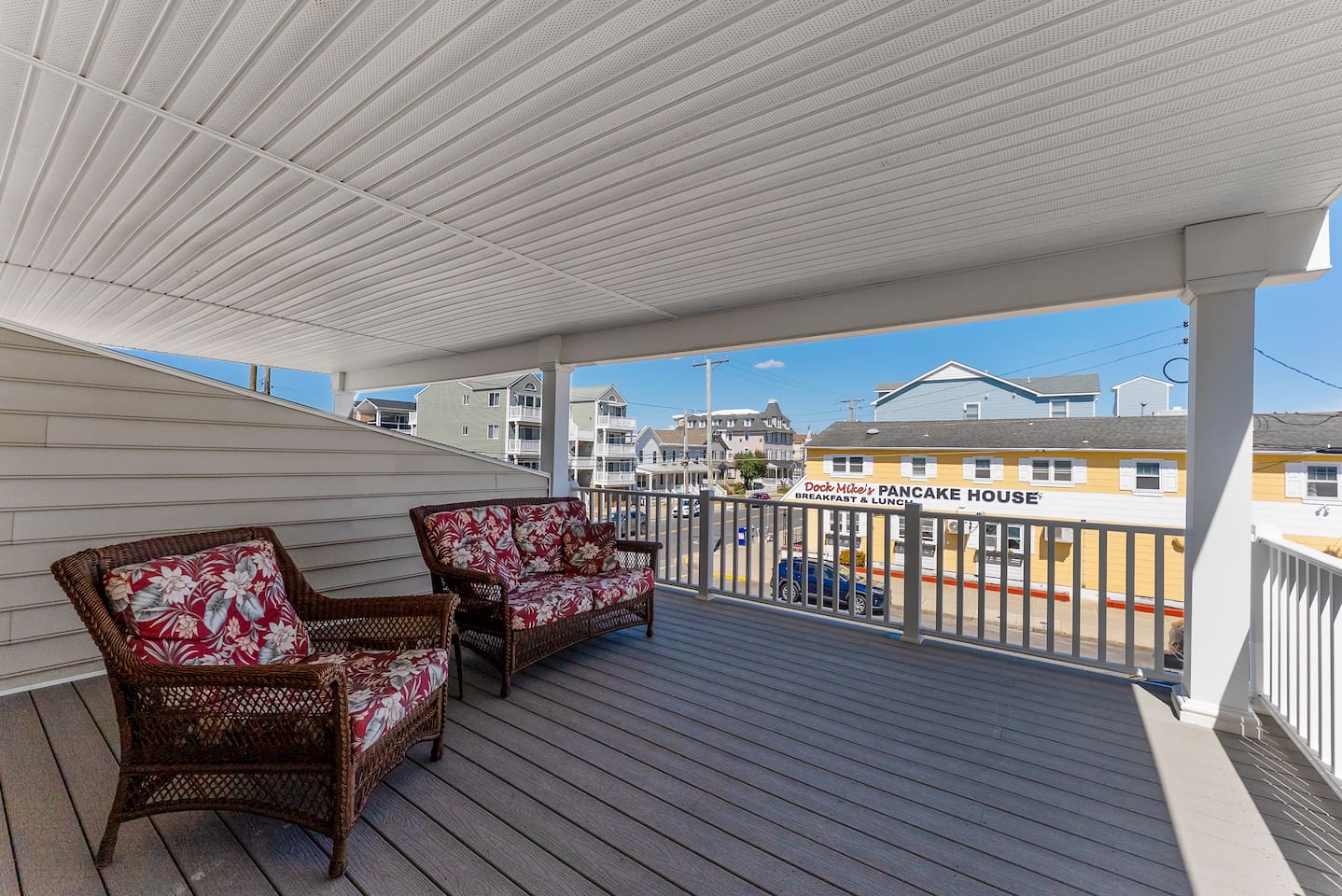 Private covered deck off of 2nd floor front bedroom with beautiful views of the ocean. 