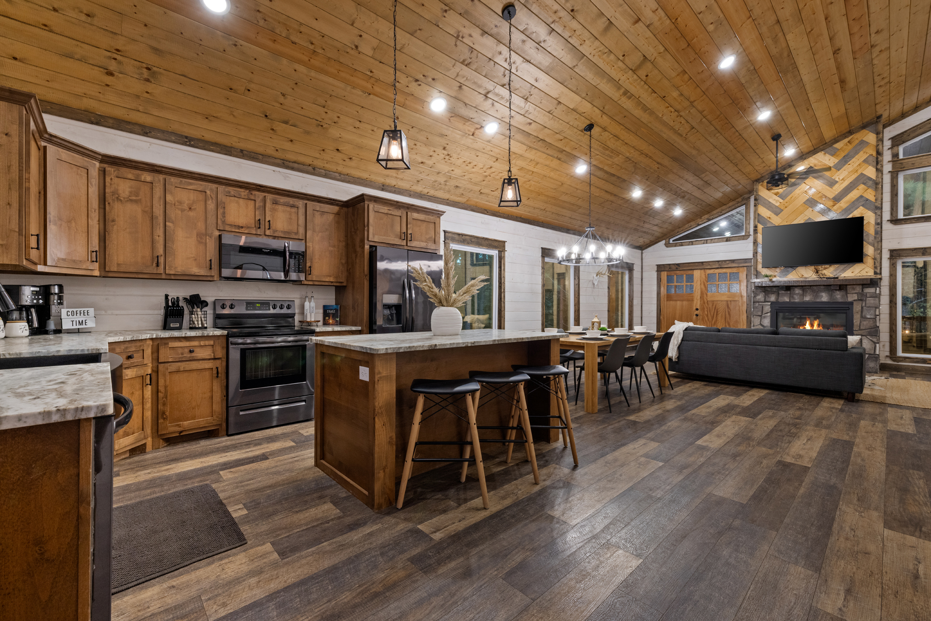 A kitchen made for actually staying in. Cook breakfast in your pajamas, make dinner together, or pour a glass of wine while everyone gathers around the island.
