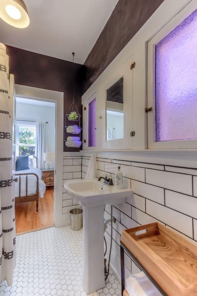 Full bath with claw foot tub and shower
