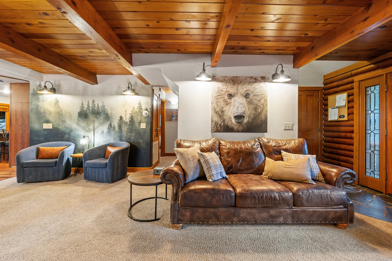 Find your own corner without leaving the room — the great room flows from fireside sofas to the quiet mural nook.