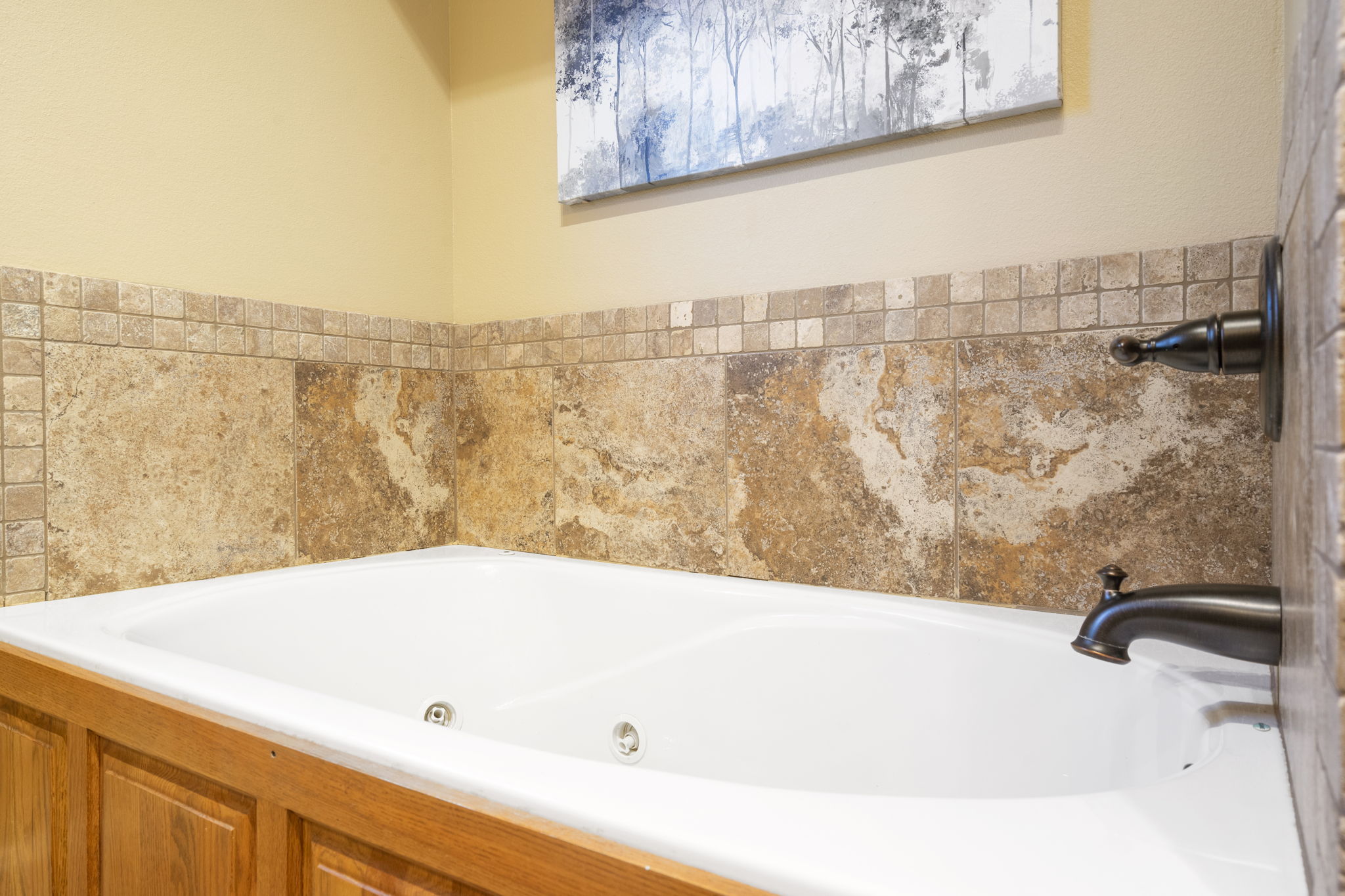 Tub in shared bathroom main level