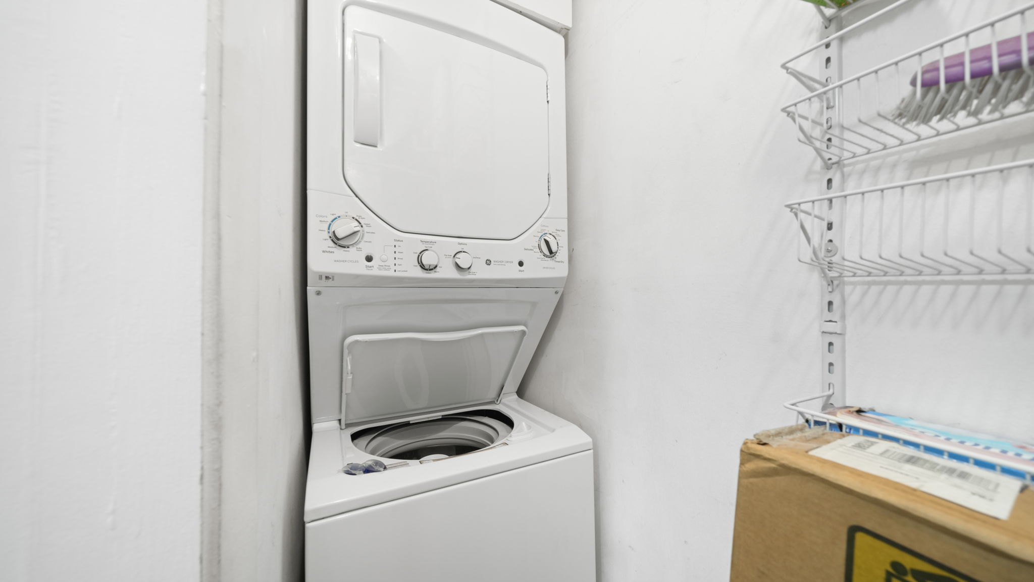 Stackable washer and dryer in unit