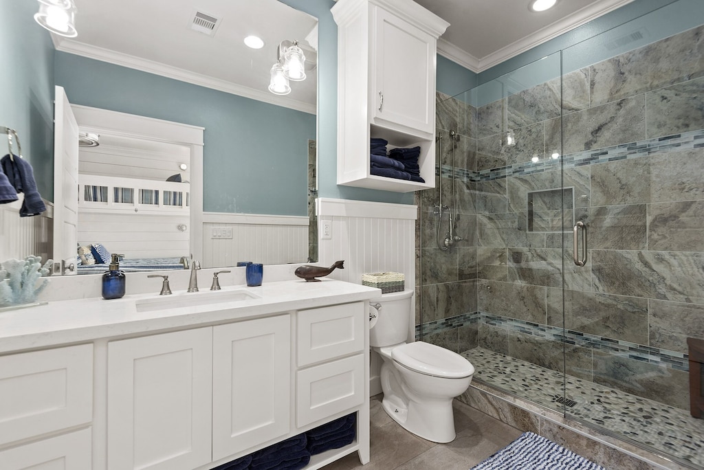 Secondary bath is accented with granite counter tops.