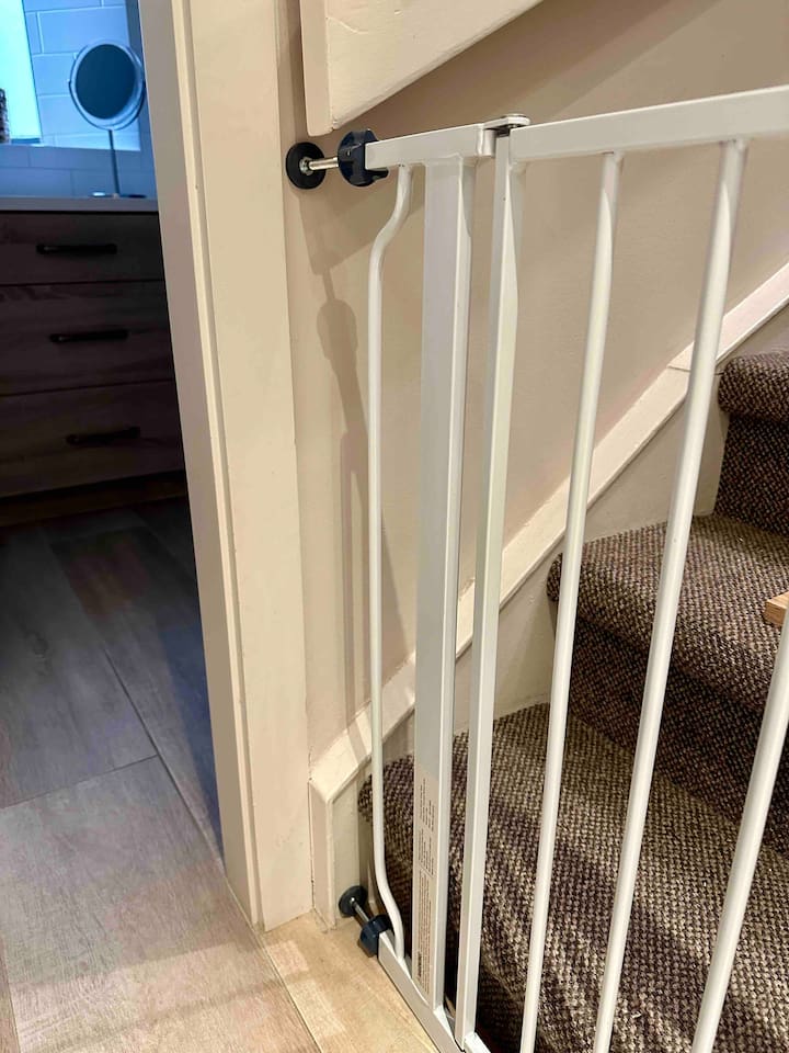 Baby gates on site with designated mounting locations for easy set up.