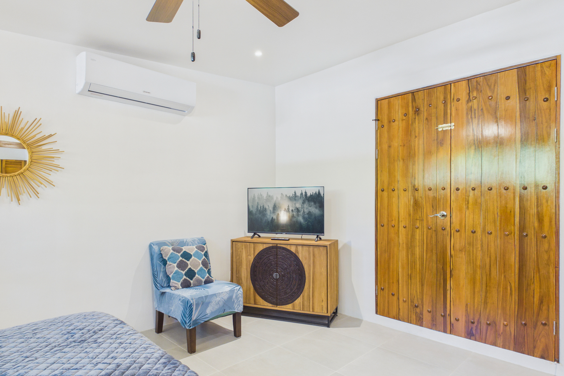 Bedroom 3.  Double doors that can be locked for privacy from bedroom 2.  If you lock these doors bedroom 3 has privacy and can only be accessed through it's own private entrance.  En suite bathroom.  AC. Smart tv.  King bed