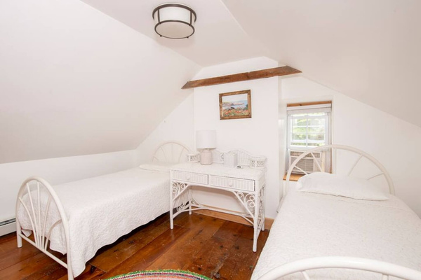 Upstairs bedroom with two twin beds
