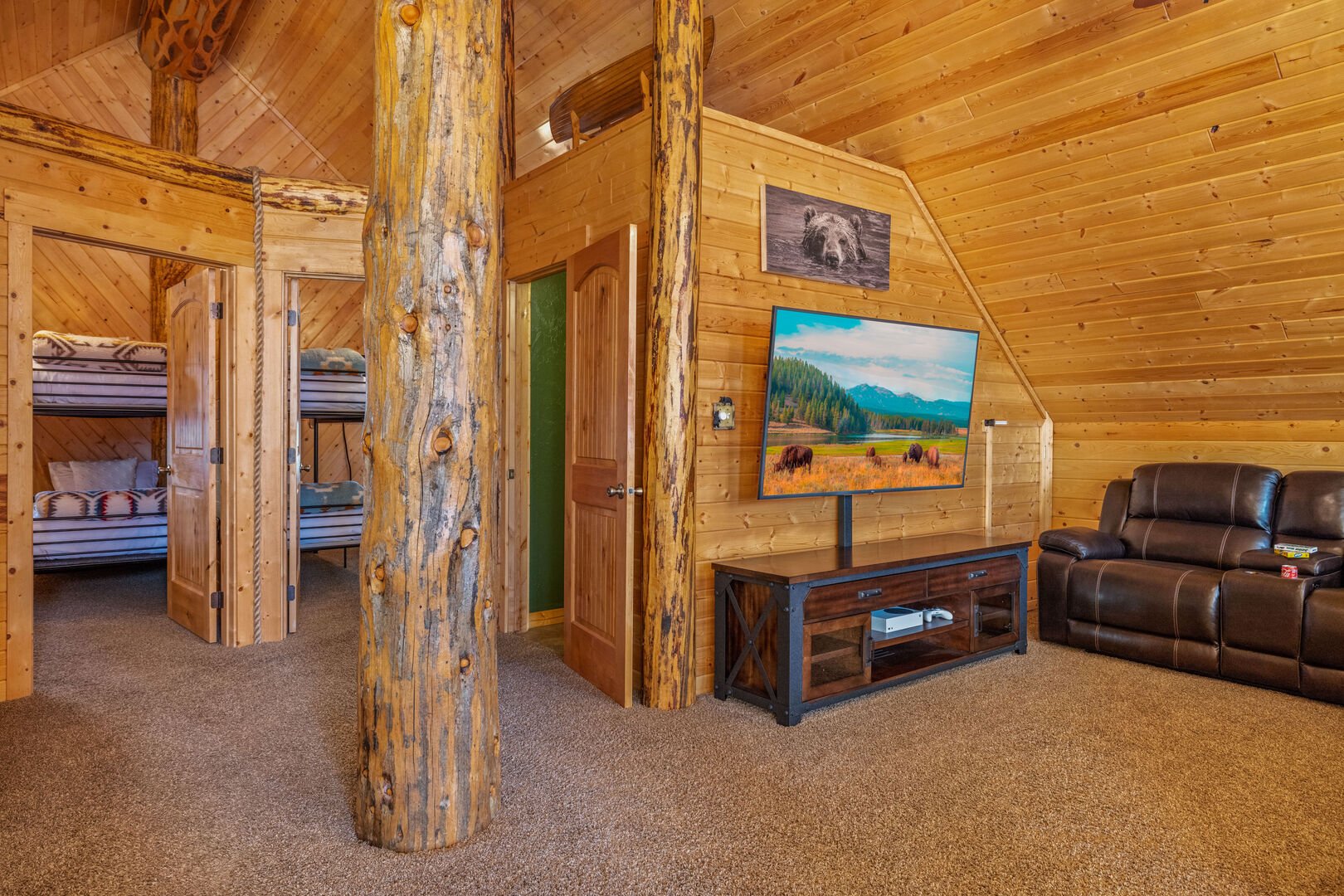 Upstairs loft area - amazing sectional couch and game area!