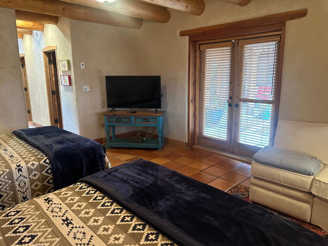 Bedroom three has a 55" TV with Roku.