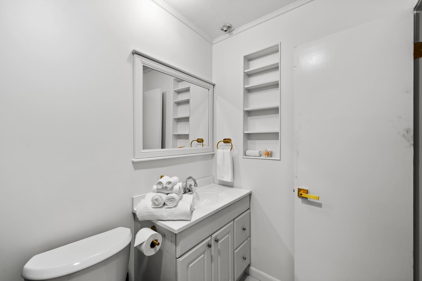 Spacious full bathroom with sleek finishes and plenty of room to refresh.