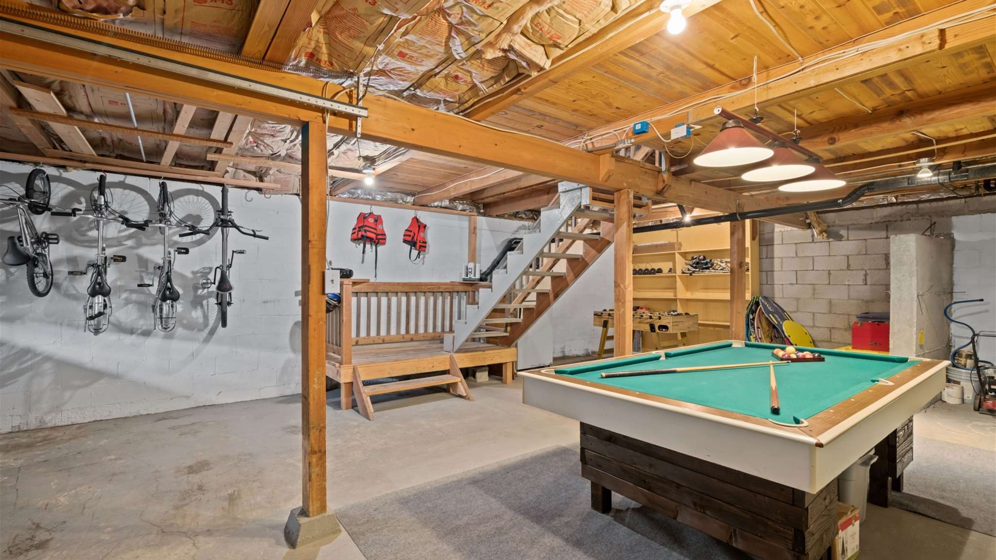 Game room with pool, foosball, darts, and ping-pong — endless fun for all ages!