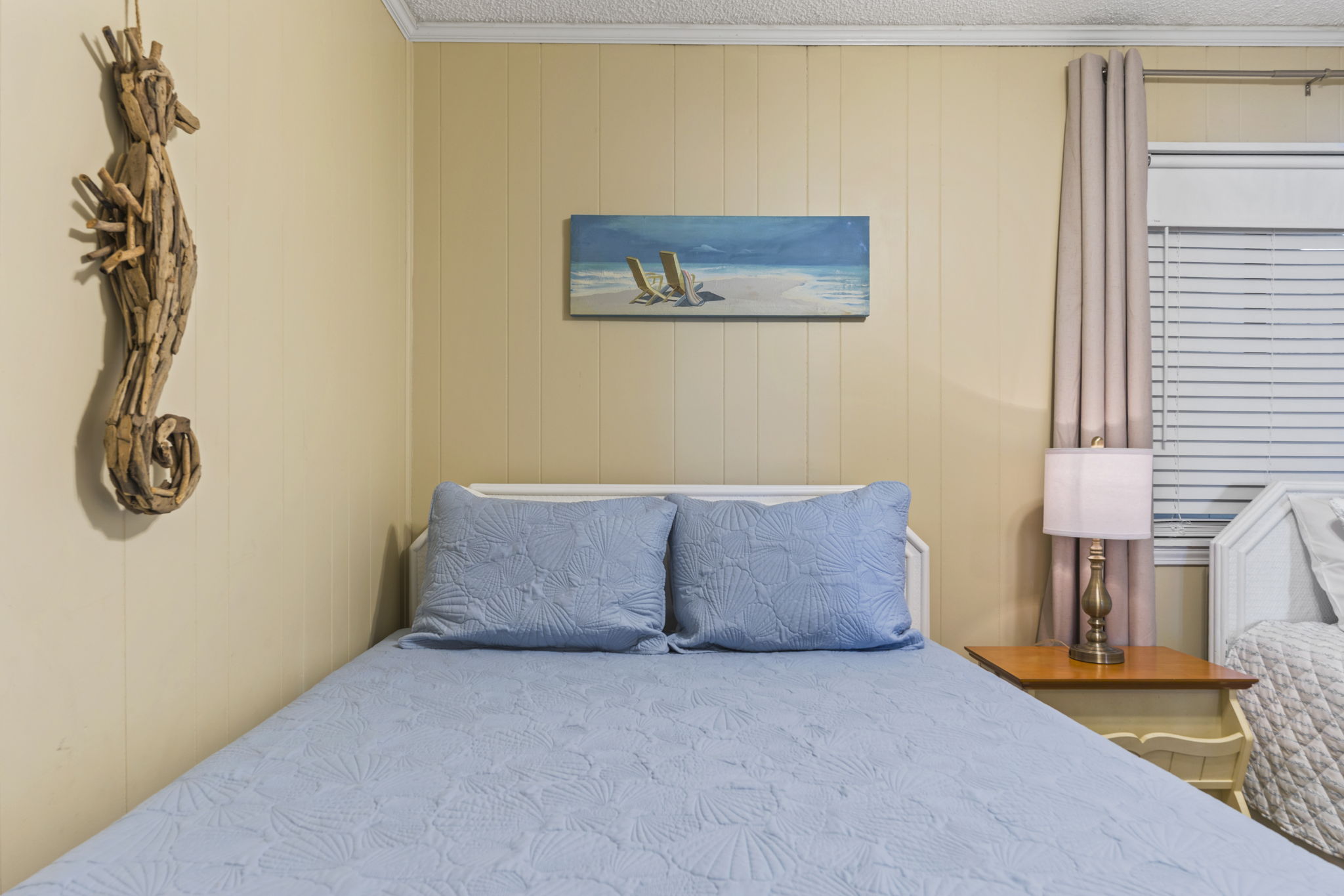 Full size bed in the guest bedroom