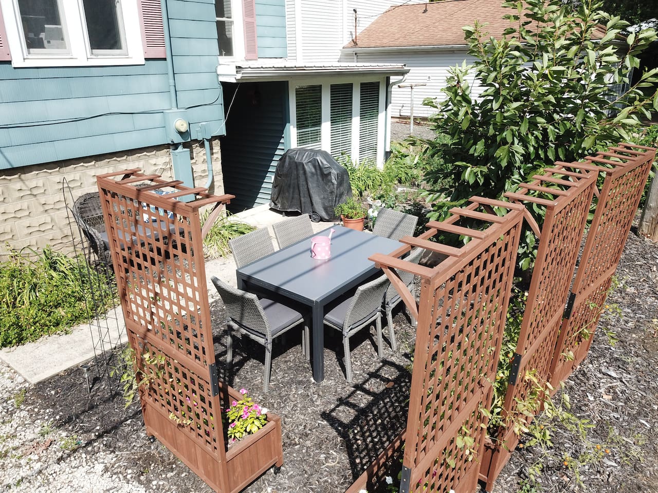 A second dining area and gas grill is available in the garden.