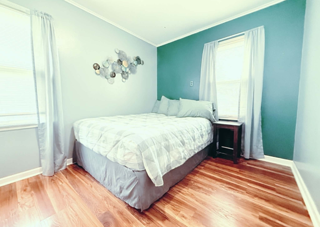 Bedroom 2 with queen bed in it.