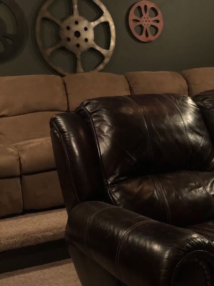 Enjoy a movie from our Home Theater complete with a brand new 65” smart tv, and leather/suede reclining sofas! New Soundbar and subwoofer just added for a full Theater experience. 